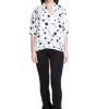 white and black polkadot blouse- front