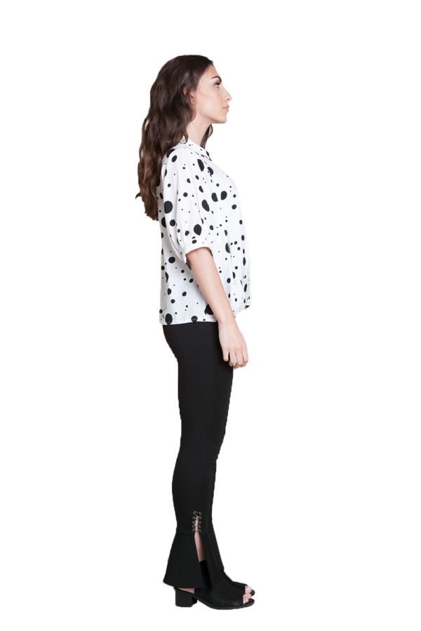 white and black polkadot blouse- side