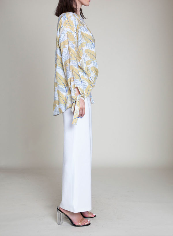 white and yellow feather printed top- side