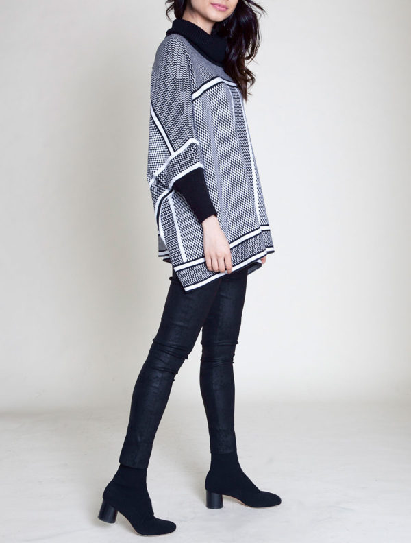 BLACK AND WHITE STRIPED KNIT SWEATER- SIDE