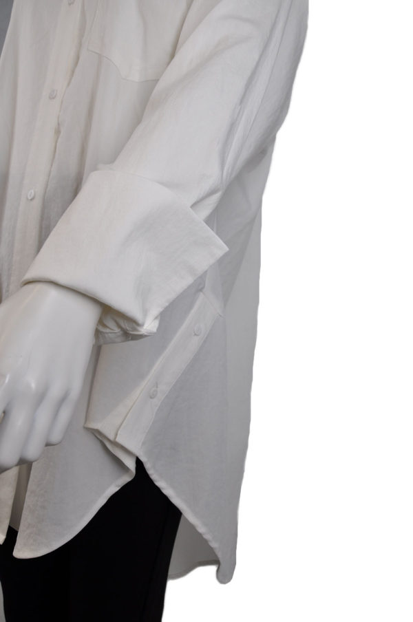 white blouse with button hem detailed sides
